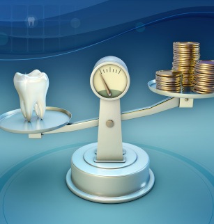 Tooth and coins on a balance scale